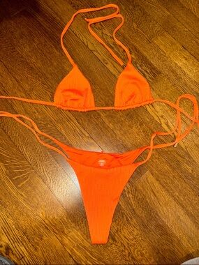 MONDAY Swimwear Orange Ribbed String Bikini Set